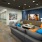 Media area with large tv and couch seating