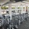 expansive fitness center with weight lifting and cardio exercise equipment