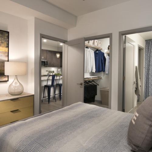 Beautiful bedrooms to fit every need a bedroom with a bed and a dresser