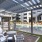 a pool with chairs and a covered patio