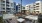 a courtyard with a lamp post and hot tubs and seating